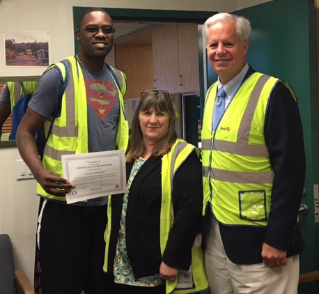 First Student Driver Ernest Vannorsdell with Location Manager Darby Chaffin and COO Paul Osland