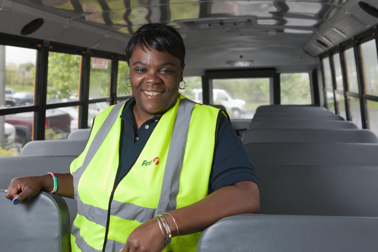 bus driver smiling on bus