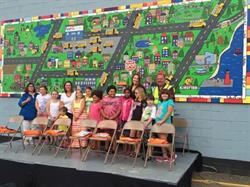 Fourteen students and three teachers were involved in the creation of the “First Student Children’s Mural”