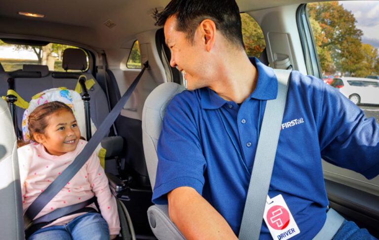First Alt driver looking back at a child