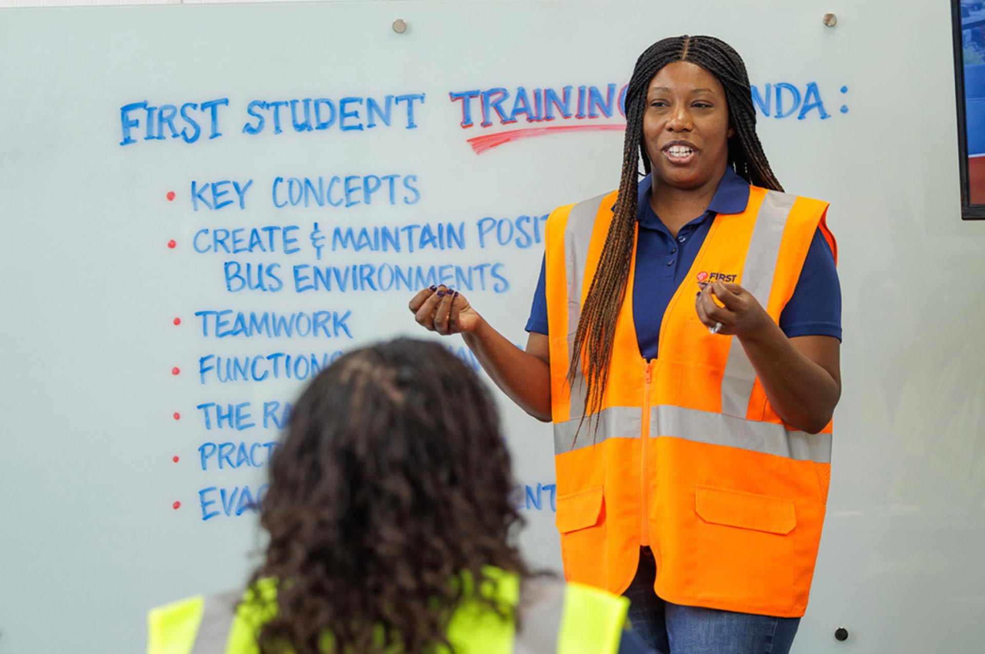 A First Student employee teaching First Student trainees