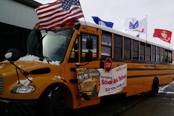 First Student Bus in Veteran's Day Parade